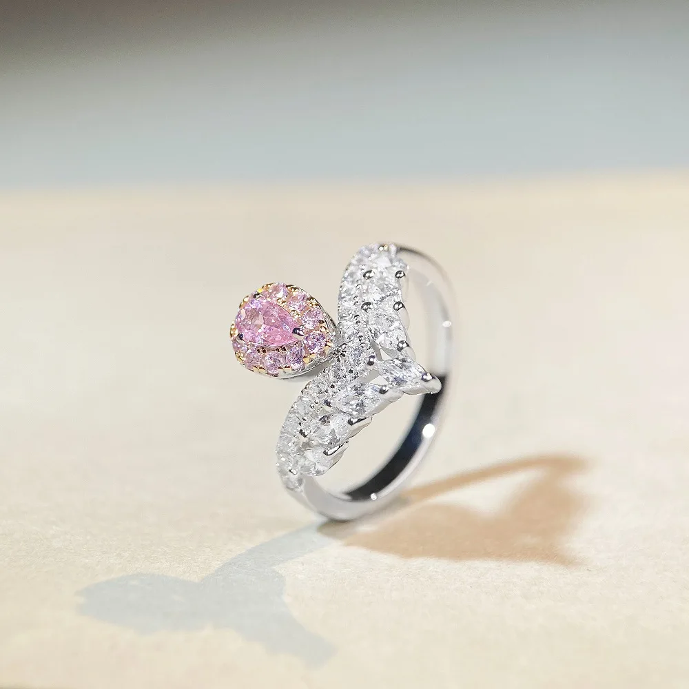 PT950 platinum ring in an elegant minimalist style with small pink diamonds