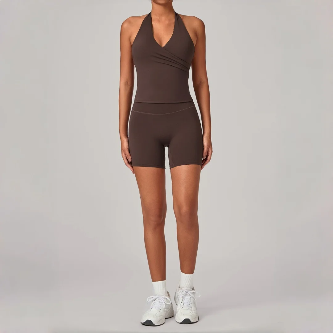 Conjunto de 2 piezas para mujer: Shorts de cintura alta con efecto levanta glúteos y top deportivo halter sin espalda para fitness, yoga, running y entrenamiento en el gimnasio.