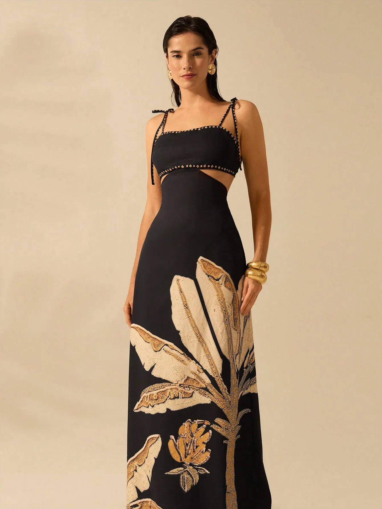 

Black Boho Maxi Dress with Tropical Leaf Print, Cutout Waist & Adjustable Straps