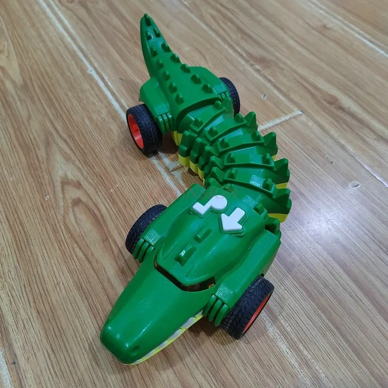 Elettrico meccanico Shark Fighting Bone Car musica per bambini Light Twisting Crawling Scorpion Crocodile Boy Puzzle Toy