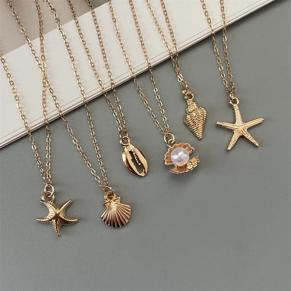 Gold Starfish and Conch Shell Pendant Necklace for Beach Lovers
