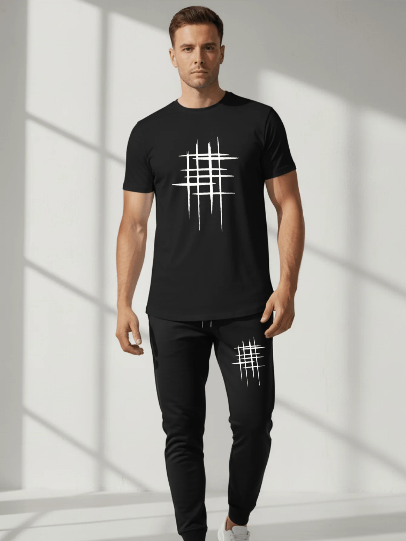 

2-Piece Set Includes Abstract Grid Print Cotton Crew Neck Short Sleeve T-Shirt & Custom Line Drawstring Ankle-Tied Joggers.