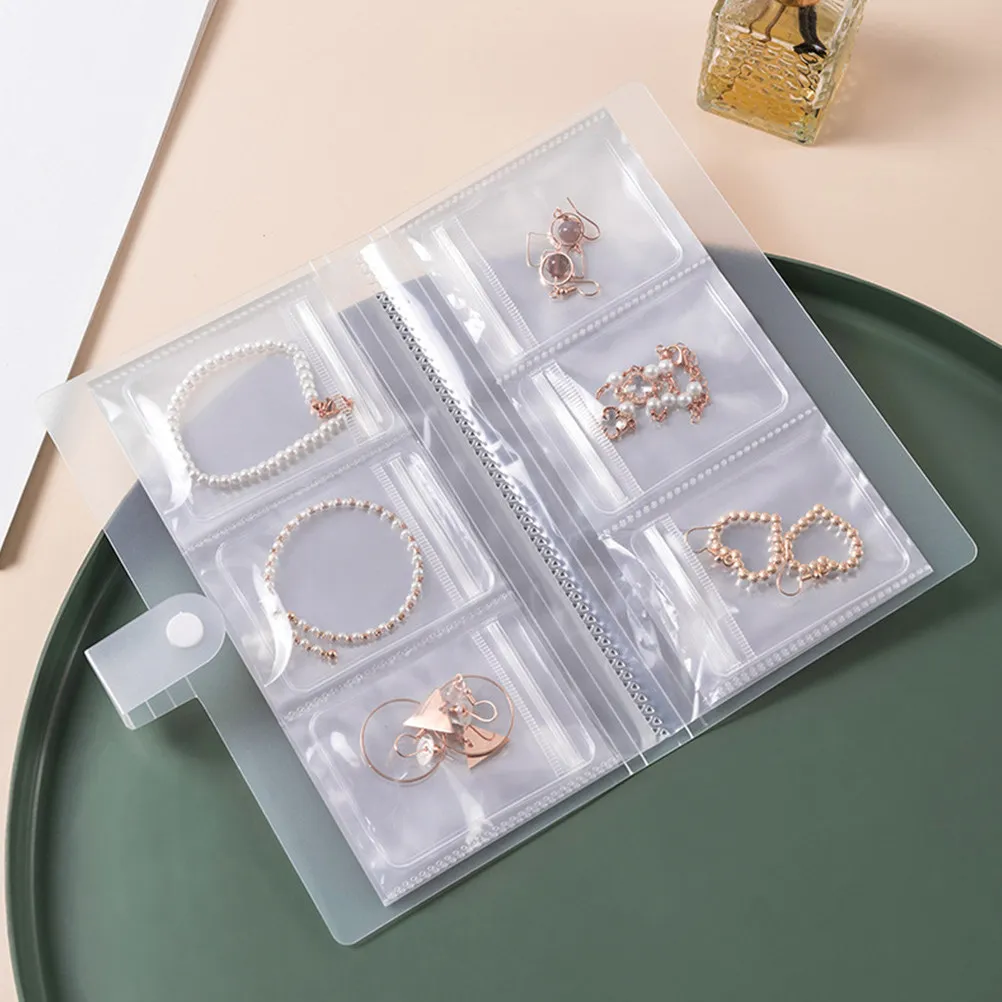 

1Set Jewelry Book Organizer with 160 Transparent Pockets for Safe Jewelry Protection Easy Find System with Separate Storage Bags