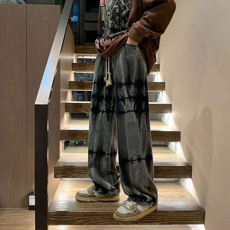 Amerykańskie dżinsy hiphopowe męskie jesienne i zimowe proste luźne spodnie modna marka przystojny główna ulica krawatowe spodnie Vibe