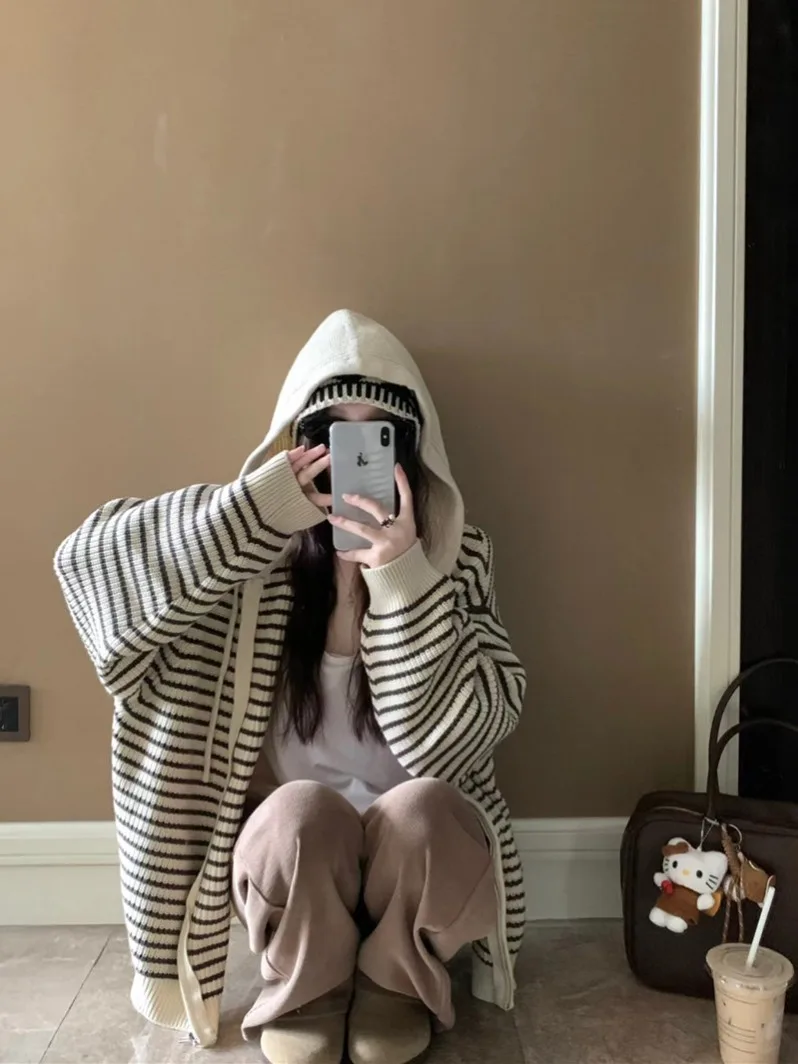 เสื้อคาร์ดิแกนถักไหมพรมสไตล์เกาหลีสุดฮิตสำหรับผู้หญิง ทรงหลวม มีฮู้ดผูกเชือก ลายทาง เปิดด้านหน้า เหมาะสำหรับฤดูใบไม้ร่วงและฤดูหนาว