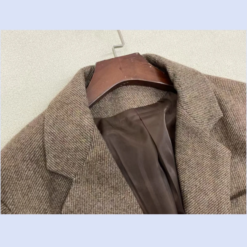 24 سنة الخريف والشتاء النسخة الكورية الجديدة عارضة صديقها نمط متعرجة نمط المرأة فضفاضة الصوف دعوى سترة