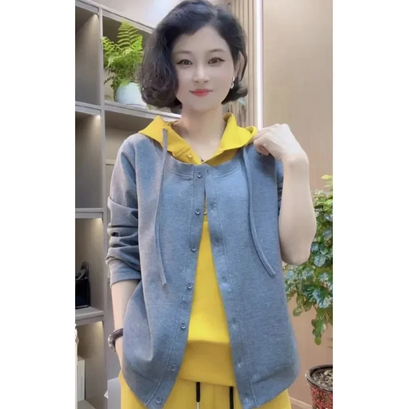 Giacca antietà per il tempo libero in cotone spaziale di alta qualità Primavera Estate Moda maglione a due pezzi finto con cappuccio a maniche lunghe