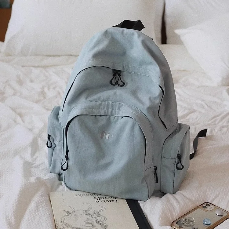 

Japanese fashion schoolbag female college student simple casual backpack design sense niche lightweight travel backpack