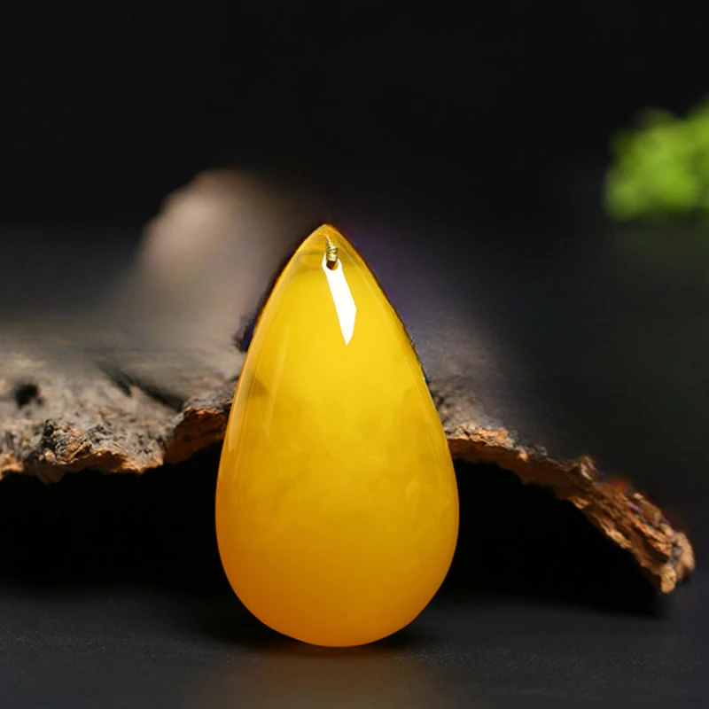 

Chicken Oil Yellow Beeswax Water Drop Pendant Female