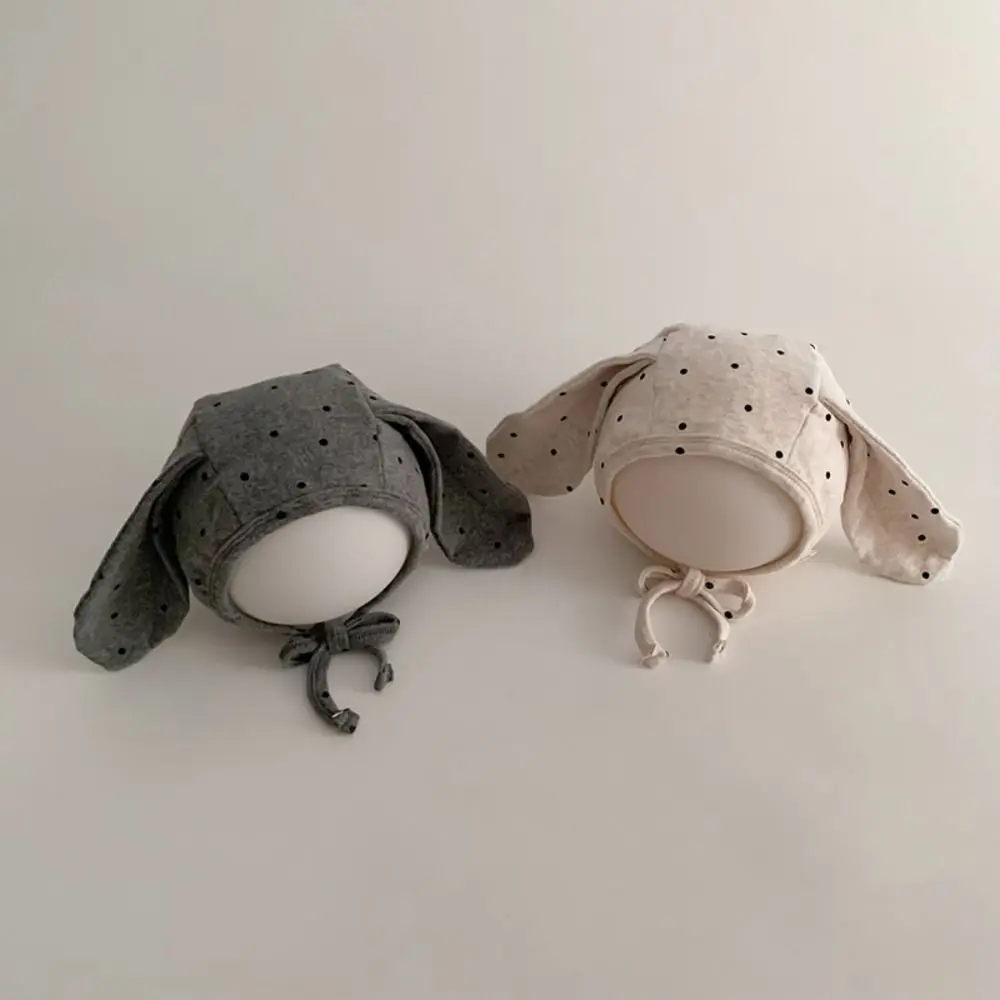 Gorro Fetal para bebé Ins, gorro con orejas de conejo para recién nacido con lunares de dibujos animados, gorro con correa para corbata, gorro infantil dulce para niños y niñas