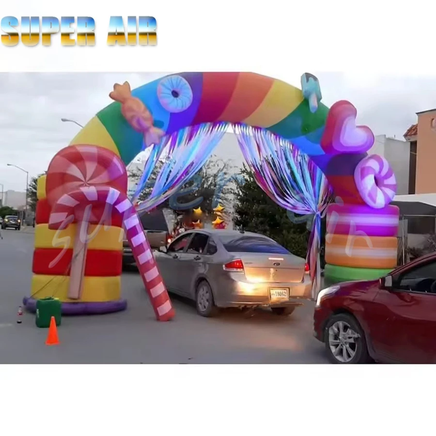 Custom beautiful outdoor inflatable arch used for children's party inflatable candy arch with door curtain