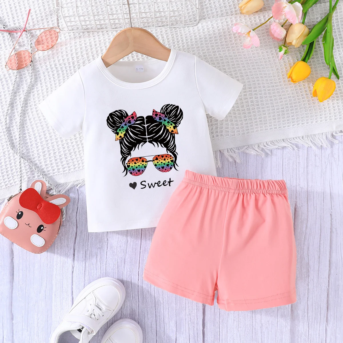 Summer's latest white short sleeved T-shirt for both boys and girls, round neck pullover+pink shorts set