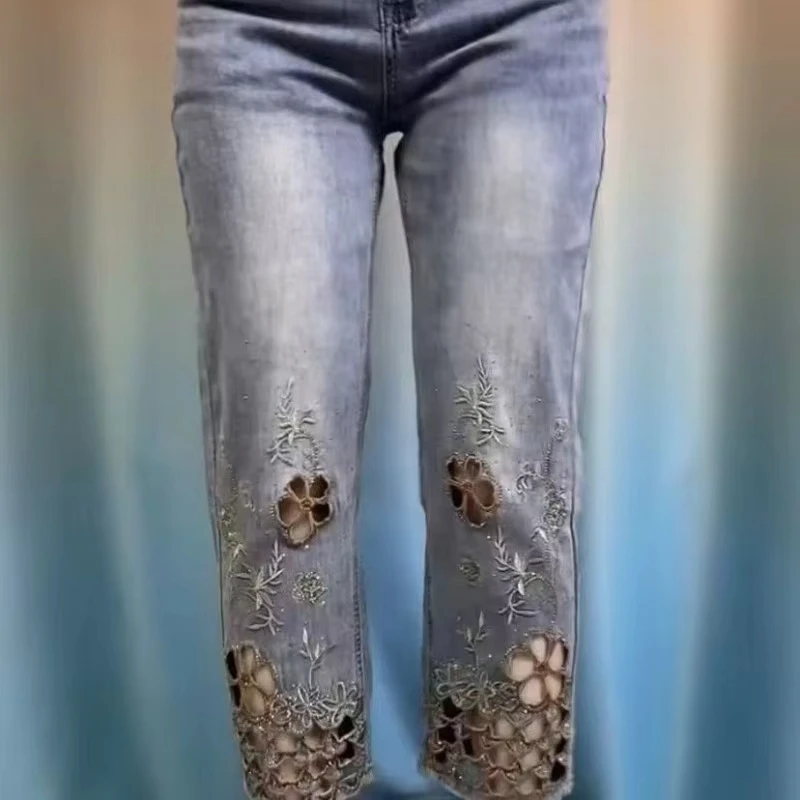 women High end hollowed out embroidered denim eight cigarette tube pants  new summer thin high waist stylish denim tube pant