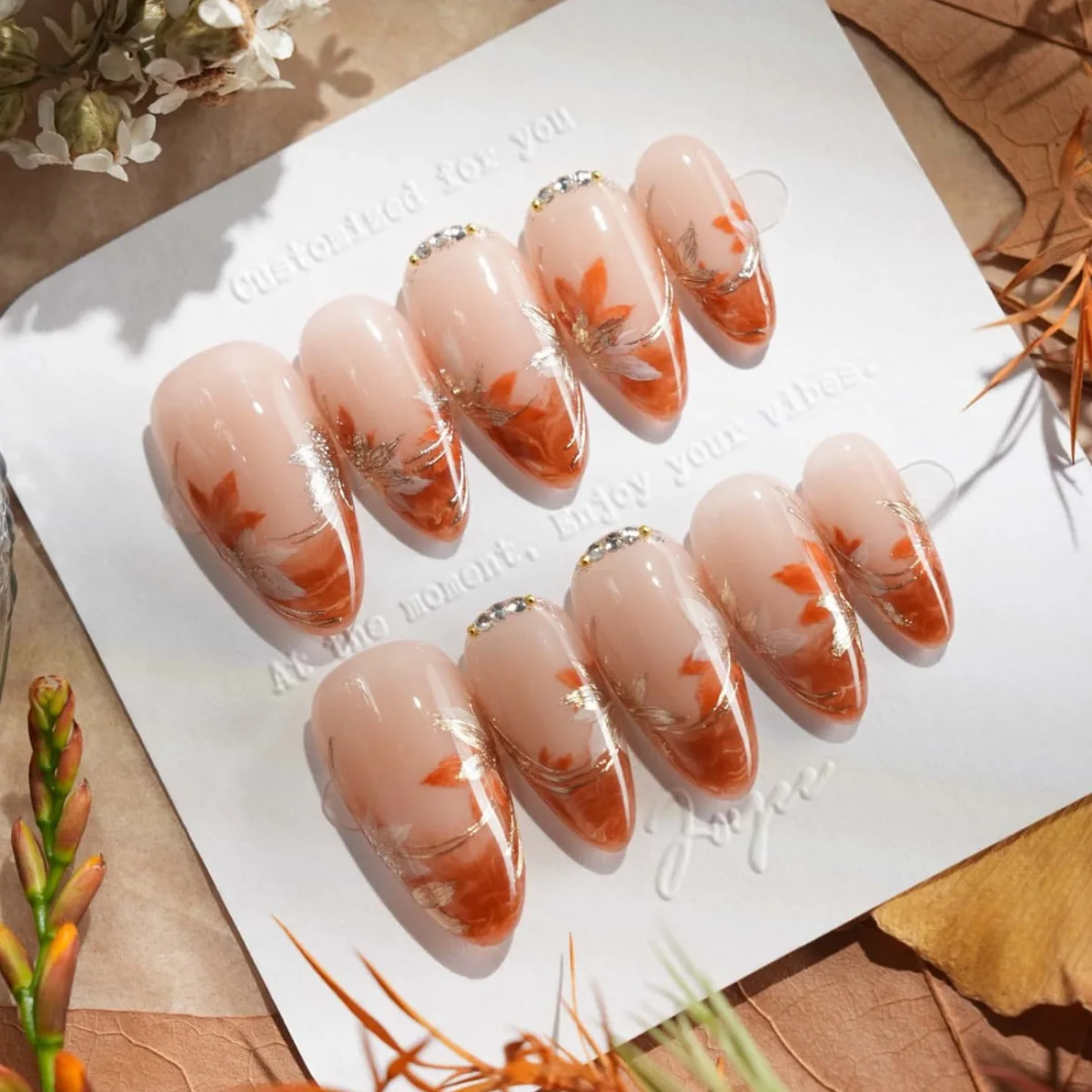 

24Pcs Orange Smudge Maple Leaf Press on False Nails Mid-length Almond Full Cover Nails Tips Rhinestone Detachable Fake Nails Art