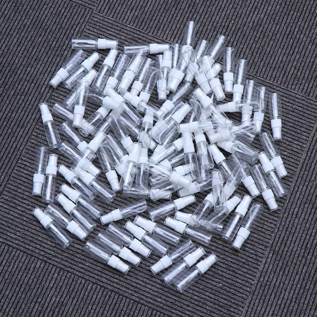 

100 pcs Spray Bottles Reusable Refillable Travel Liquid Containers Pump Dispenser Leak Proof Material