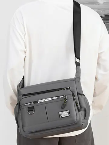 Men's business single-shoulder bag, suitable for business trips and work, made of nylon material, with a single shoulder strap.