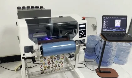 

A3 Roll to Roll Digital Printers CMYK W Varnish 30CM UV DTF Printers AB Film Wide Format UV Printers