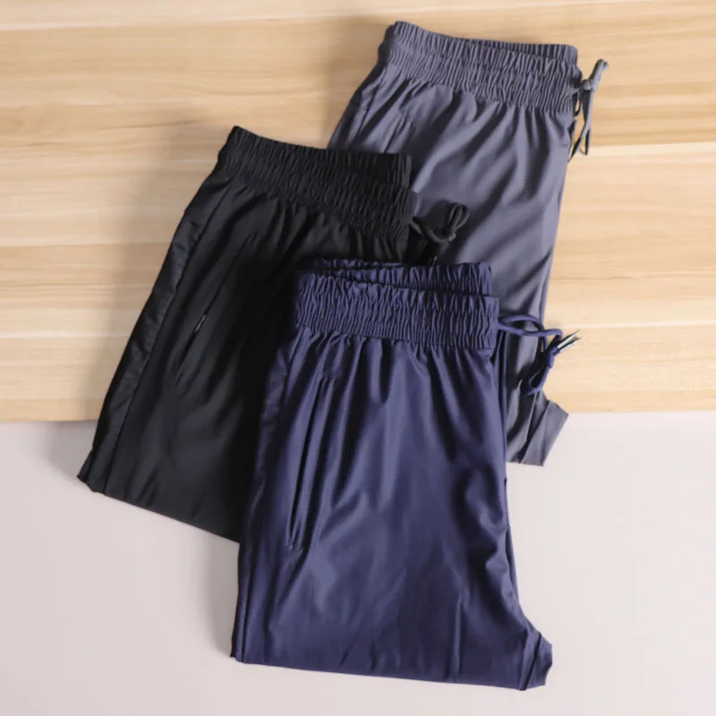 

Men's Summer Lightweight Ice Silk Fabric Spor Casual Pants Breathable Elastic Pure Color Straight Leg Long Trousers