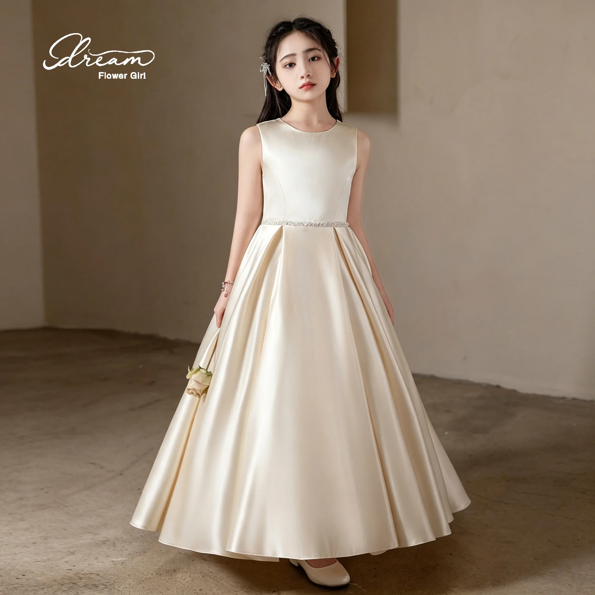 Classic white round-neck sleeveless backless floor-length evening dress with bow decoration.