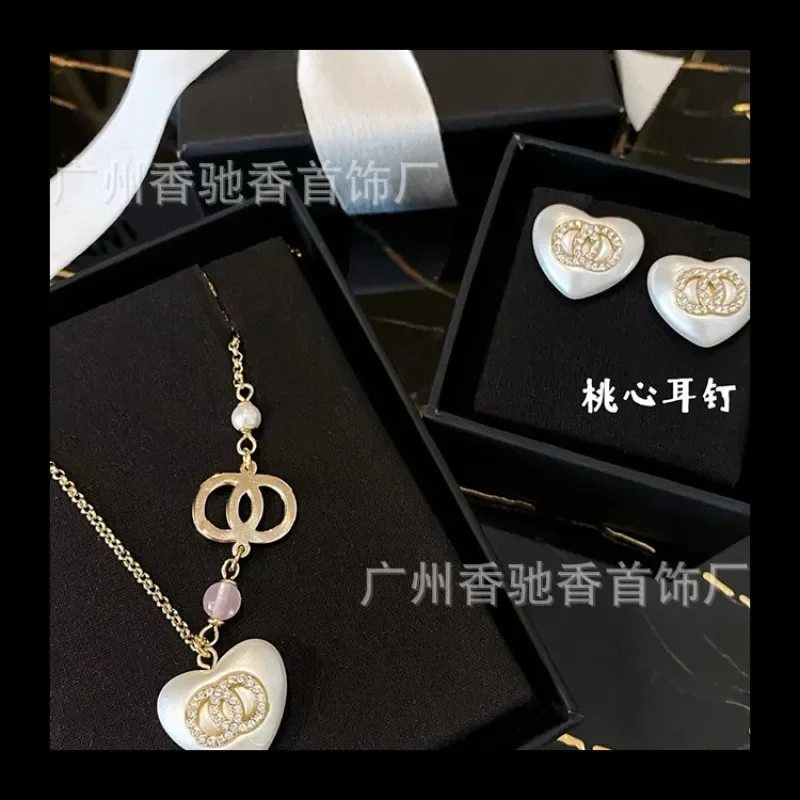 

Xiaoxiang's New White Love Diamond Necklace Bracelet Earrings Lady Temperament Versatile Peach Heart Explosion