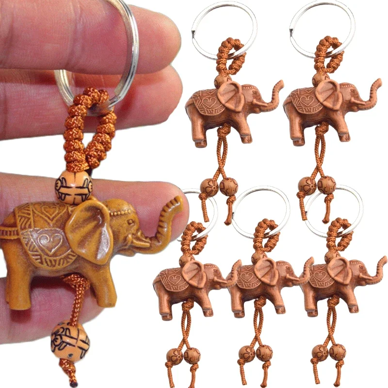 5/1 Uds nuevo llavero de elefante tallado en madera de melocotón rico llavero de Animal de la suerte colgante bolsos de mujer encanto llaveros de casa