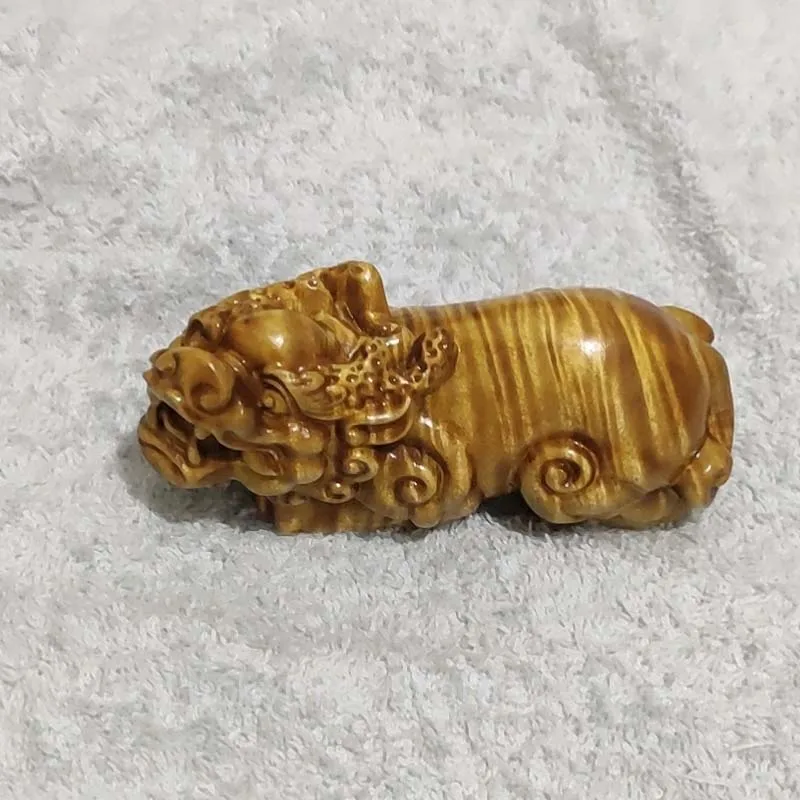 Golden Nanmu Pixiu Hand Carving Natural Water Ripple Grain Worry Hand Piece Wealth Ornament for Home Office Desktop Decor
