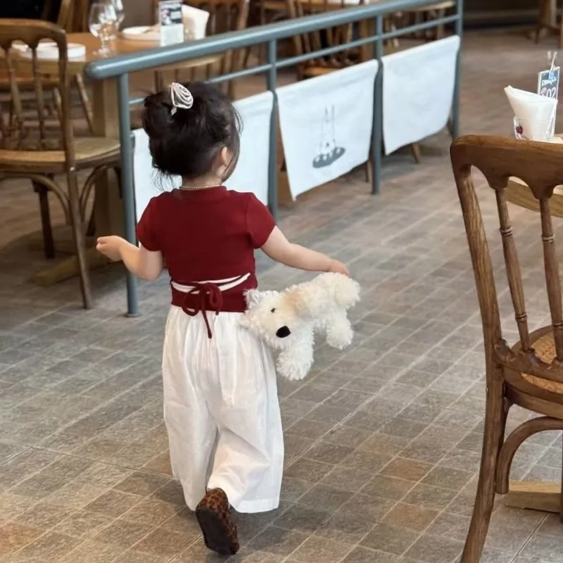 

Summer New Girls' Baby Red Backless T-shirt Wide Leg Pants Two Piece Set Korean Edition Girls' Short Sleeve Set 2026