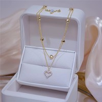 Double-layer heart-shaped golden flashing zircon clavicle chain niche design female temperament necklace