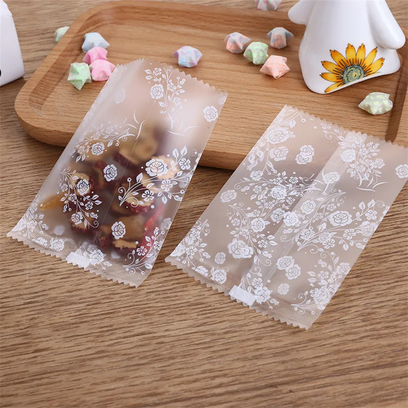 

100Pcs Translucent Frosted Rose Flower Pattern Fruit Tea Candy Cookie Machine Sealed Bags Plastic Packaging