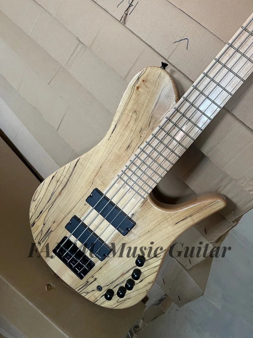 5 String natural bass guitar, Spalted Maple top, maple neck running through ASH wood body, black bridge, active battery