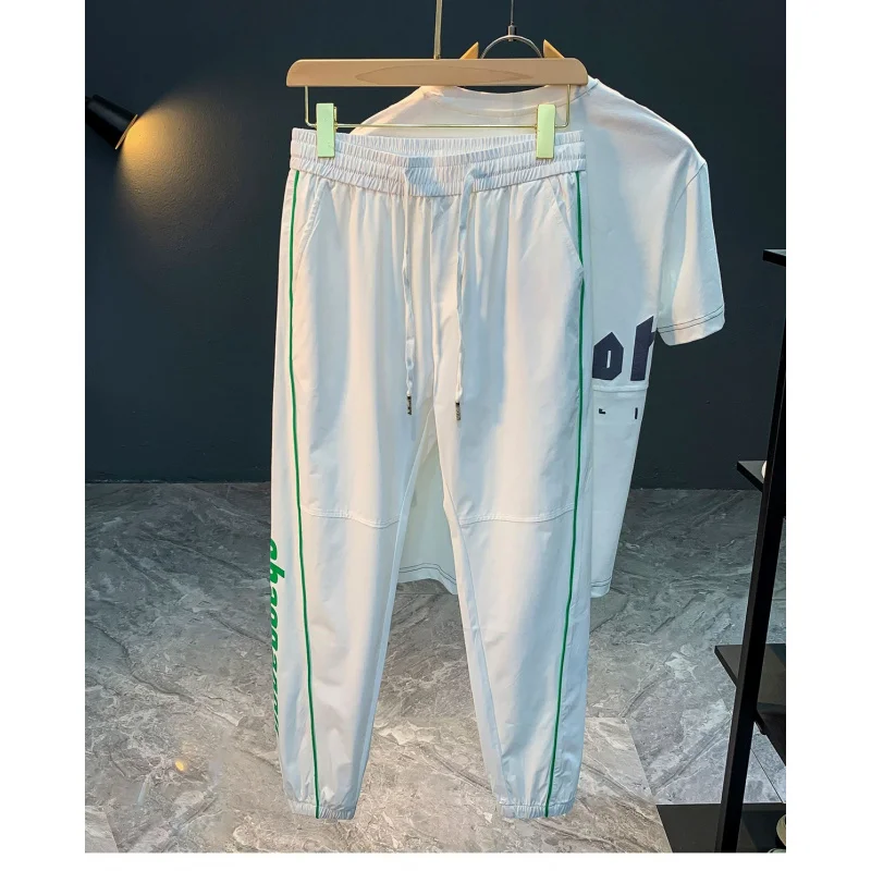 

2025 quick drying casual pants men's ice silk nine point tied foot summer ultra-thin trendy brand printed sports pants
