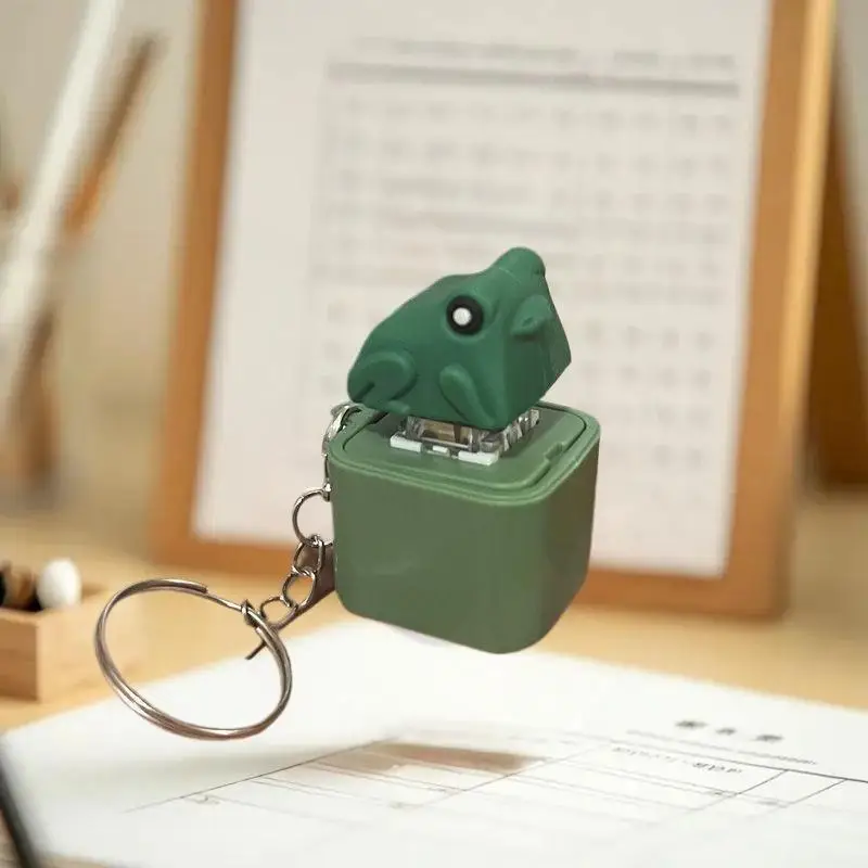 Lustiger schlagender Frosch-Enten-Schlüsselanhänger, wiederaufladbare Tastatur, Fidget Clicker, Sound-Schlüsselanhänger mit LED-Licht zur Stressabbau