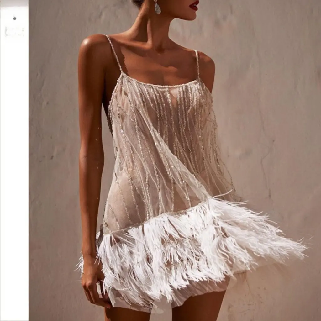 Estilo europeu e americano saia sem costas vestido de festa sexy malha lantejoulas borla detalhe em camadas suspender design