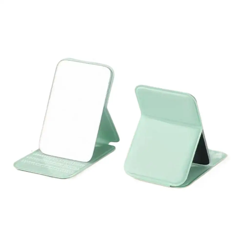 Espejo de maquillaje plegable de alta calidad, espejo de maquillaje portátil, espejos de maquillaje de pie de escritorio de Color sólido creativos de un solo lado para mujer