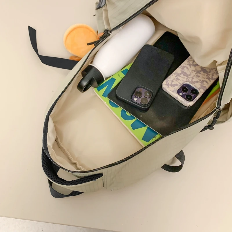 Nova moda feminina dos homens de alta capacidade à prova dwaterproof água faculdade mochila na moda feminina portátil sacos escolares bonito menina viagem saco livro legal