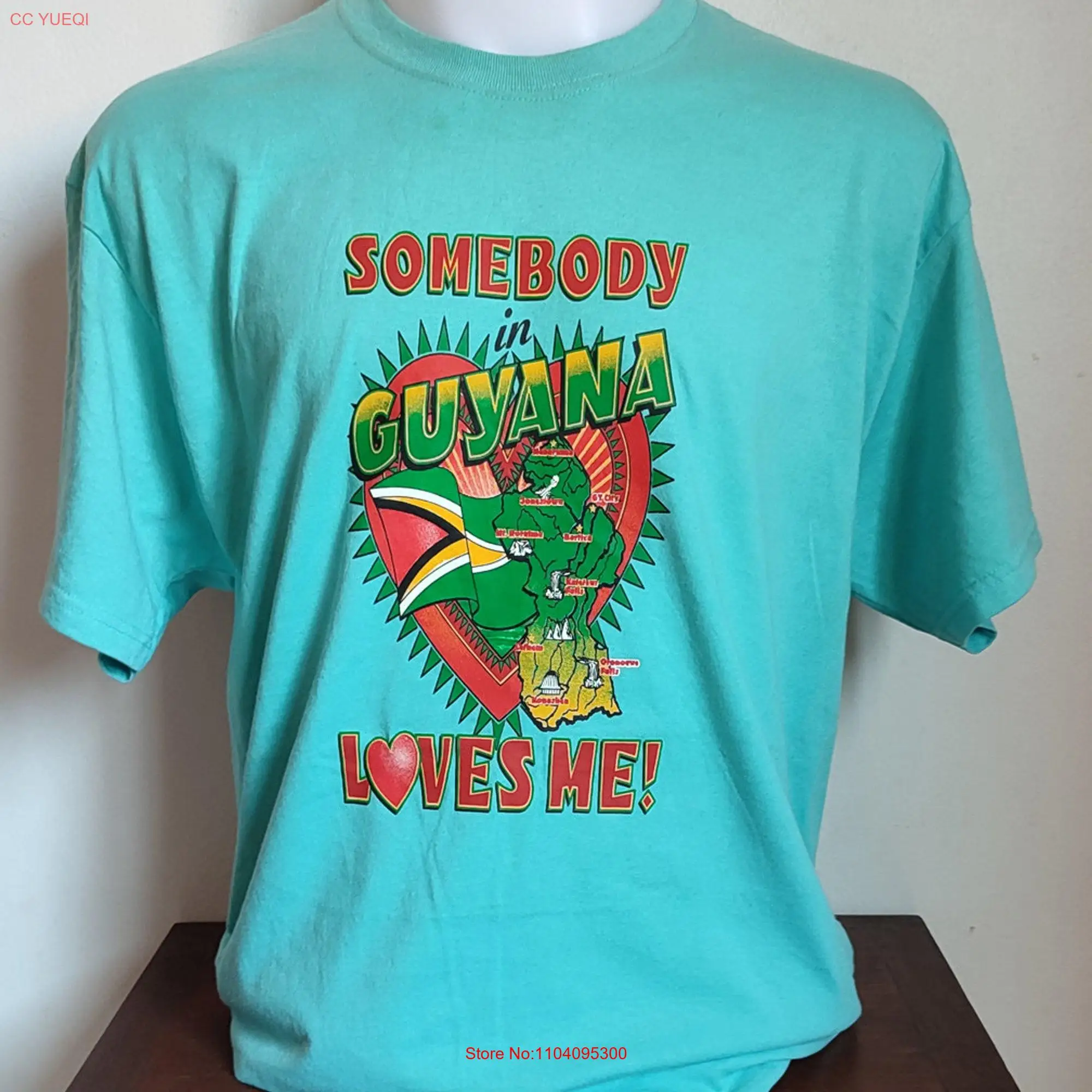 Somebody Loves Me Guyana T Shirt Size Large Turquoise Used Condition 112 long or short sleeves