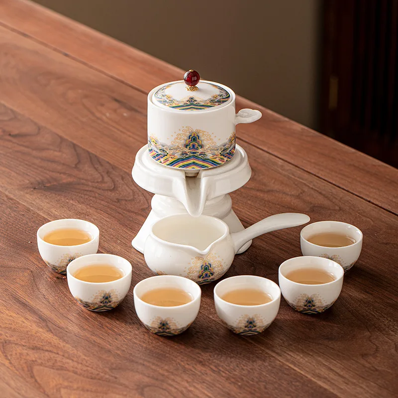 

Высококачественный белый фарфоровый ленивый чайный сервиз для домашнего использования, новинка 2025, автоматический вращающийся чайник для заваривания чая, полный подарочный набор