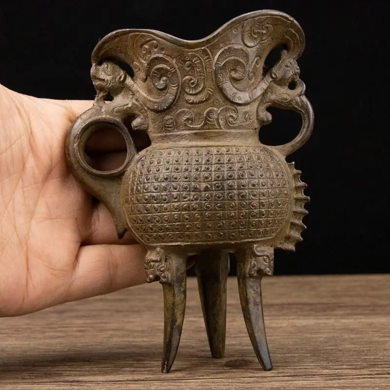 Chinese antiques and antiques collection copper tripod double-eared dragon-eared wine jar auspicious beast wine cup decorative a