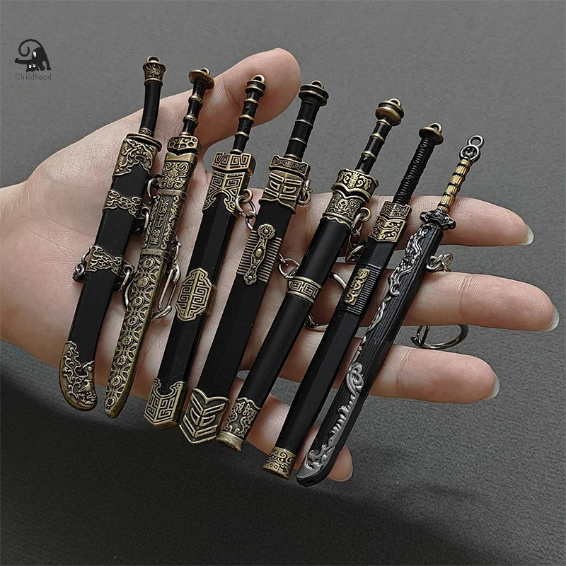 1pc Novelty Mini Sword Shape Pendant Keychain Creative Weapon Model Toy Key Ring Fashion Backpack Decoration Accessories Gifts