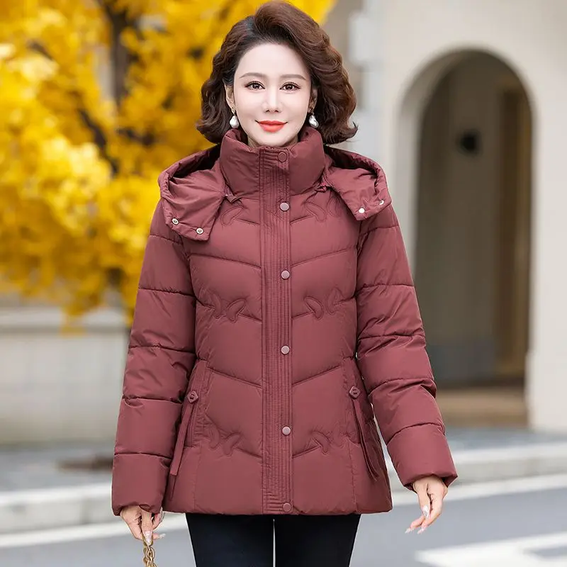 سترة شتوية جديدة 2025 ملابس خارجية على الطراز الكوري سترة فضفاضة متوسطة الطول مبطنة بالقطن مع جيوب ملابس خارجية عصرية TS461