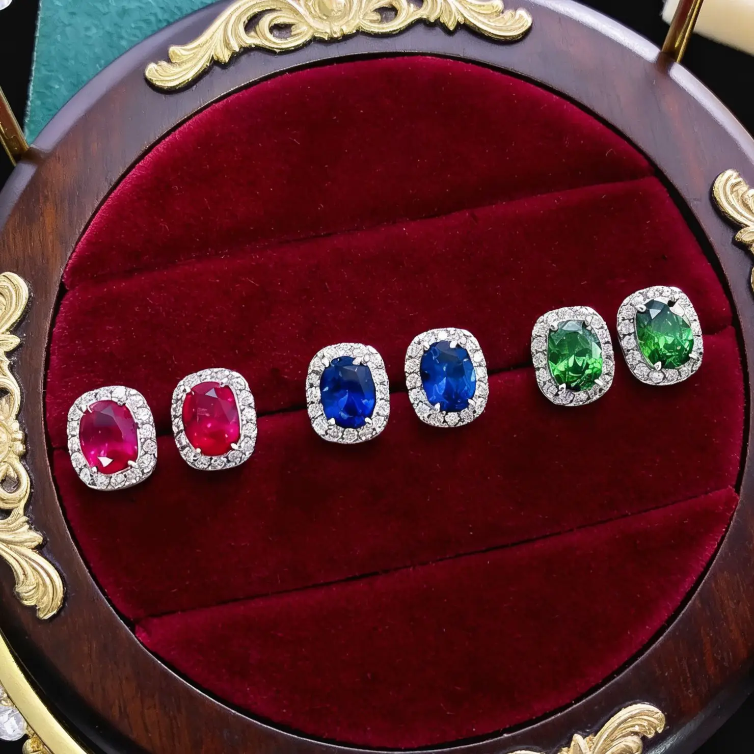 Fashionable earrings - realistic oval ruby and emerald stud earrings, simple and fashionable. Cultured sapphire stud earrings.