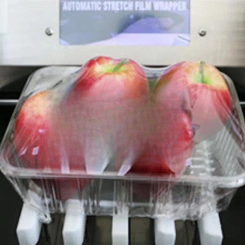 Plastic heat shrink packaging food shell vacuum packaging packaging machine