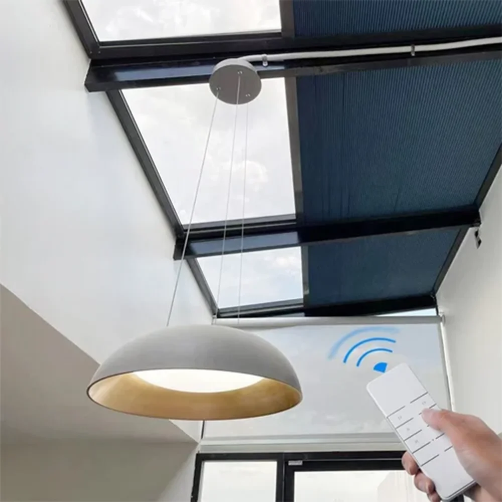Remote control velux skylight honeycomb blinds. Motorized cellular blackout for roof windows. Easy reach. Smart home decoration.
