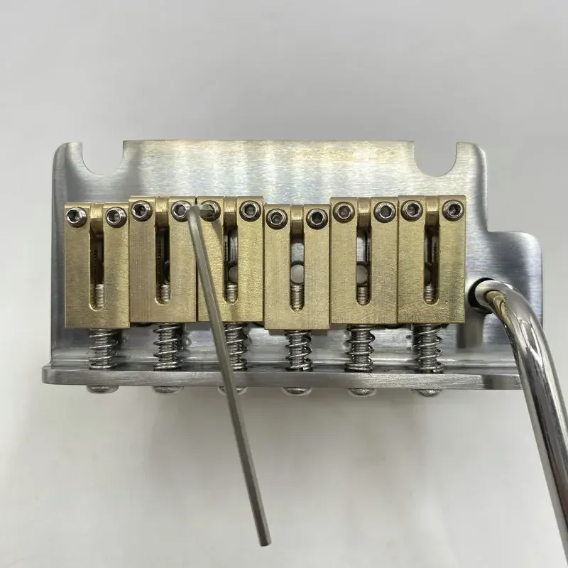 ‌Japanese-made mini double-locking tremolo (2-point pivot) with silver-plated brass saddles & base precision CNC-machined