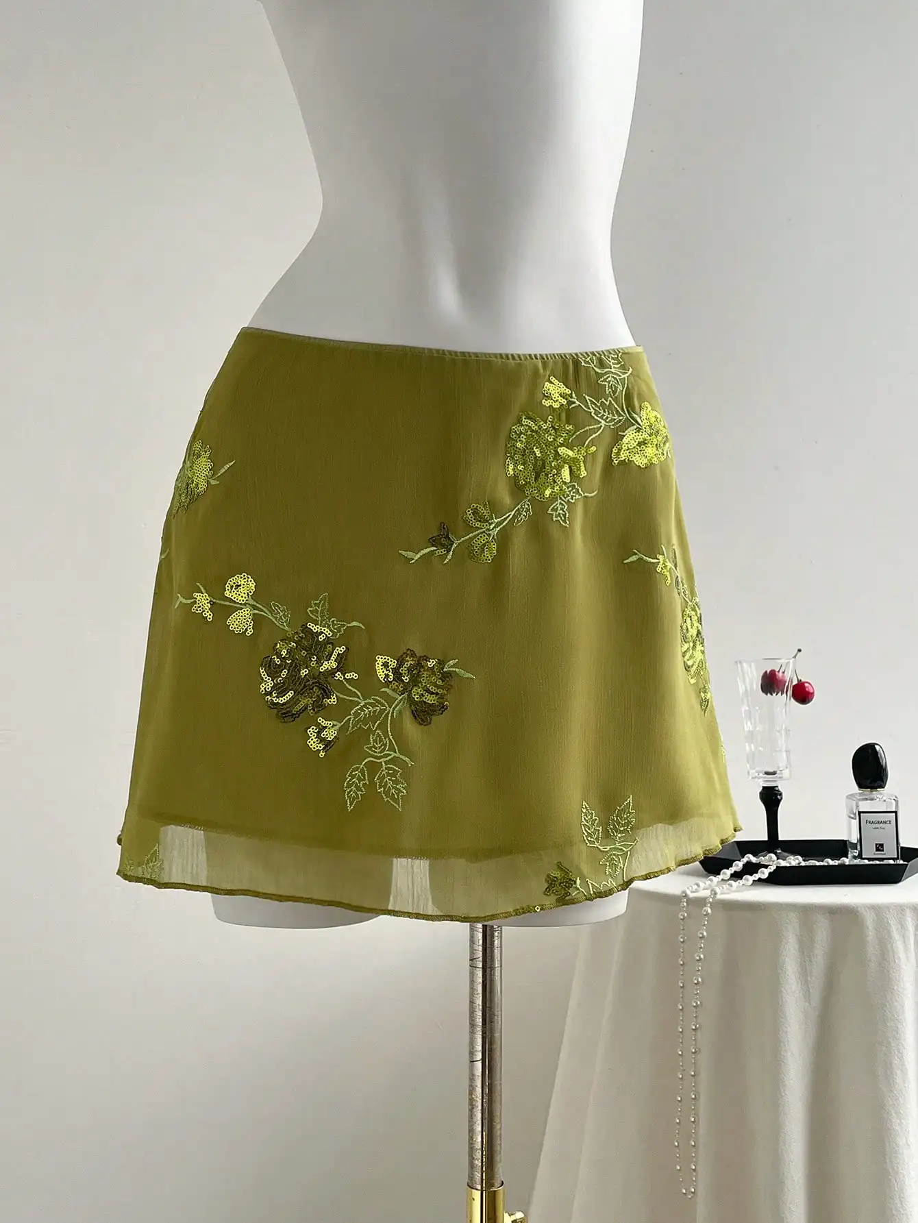

Women's Mini Skirt with Floral Embroidery Sheer Hem Detail Ideal for Summer Vacations and Casual Gatherings ﻿