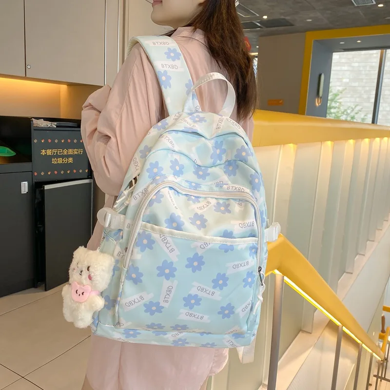 Korean version cute printed backpack 2023 new student backpack large capacity casual knapsack