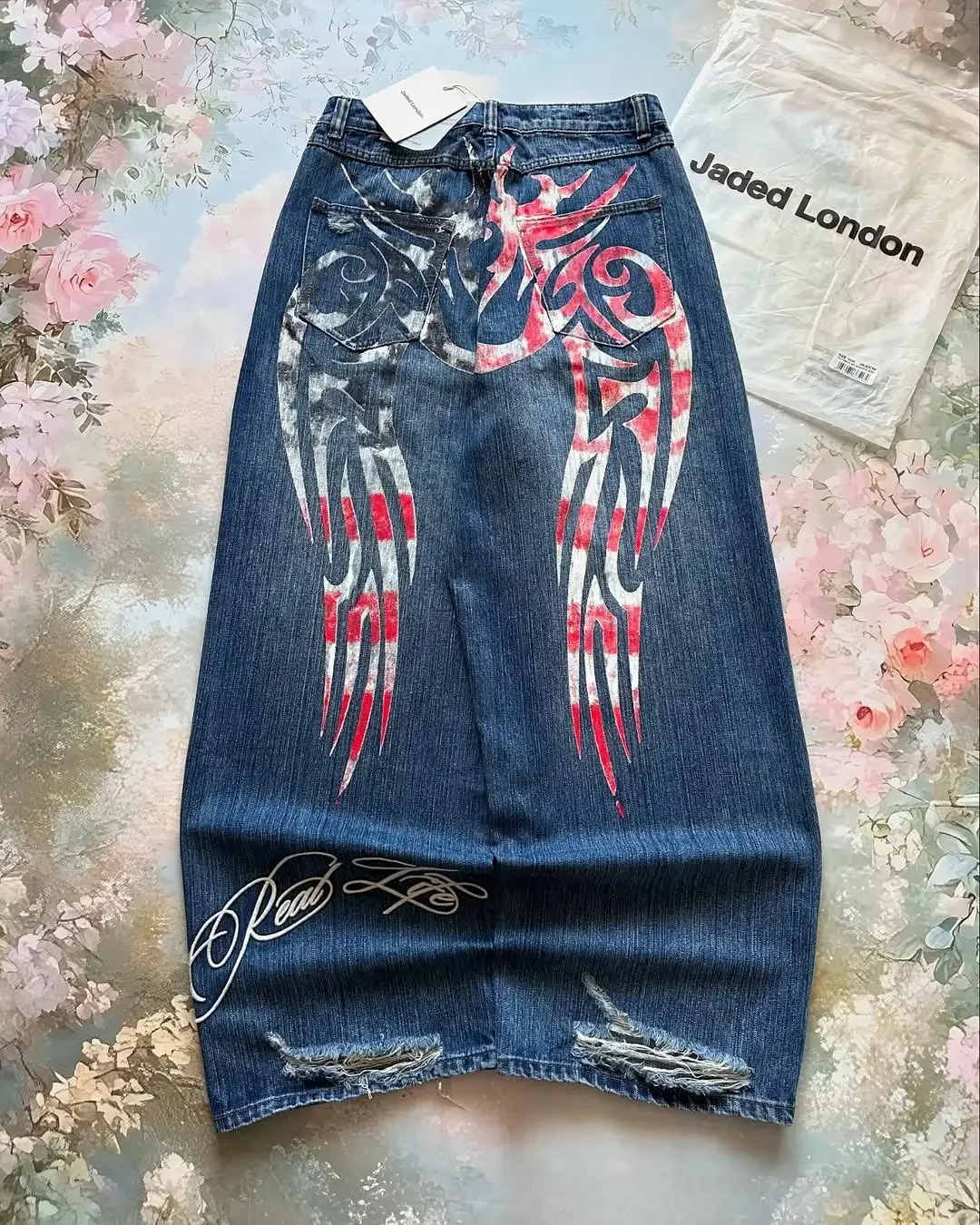 جينز فضفاض مطبوع بنمط جديد لعام 2025 للرجال والنساء عالي الشارع عتيق على طراز الهيب هوب غير رسمي للزوجين بنطال واسع الساق