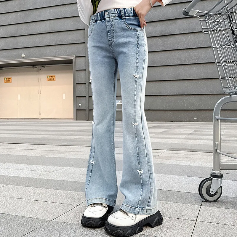 女の子の夏のファッションジーンズ蝶新しい Arrvial キッズヴィンテージタイトデニムフレアパンツ十代のスリムズボン