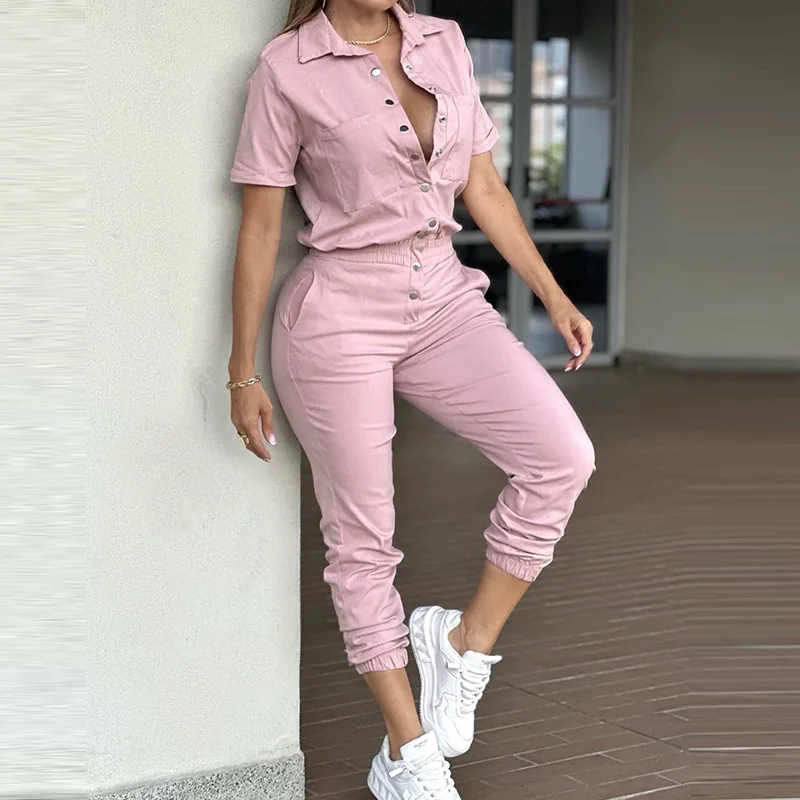 Elegante playsuits met revers en korte mouwen Chique elastische rompertjes met meerdere zakken High Street Fashion Effen jumpsuits met enkele rij knopen