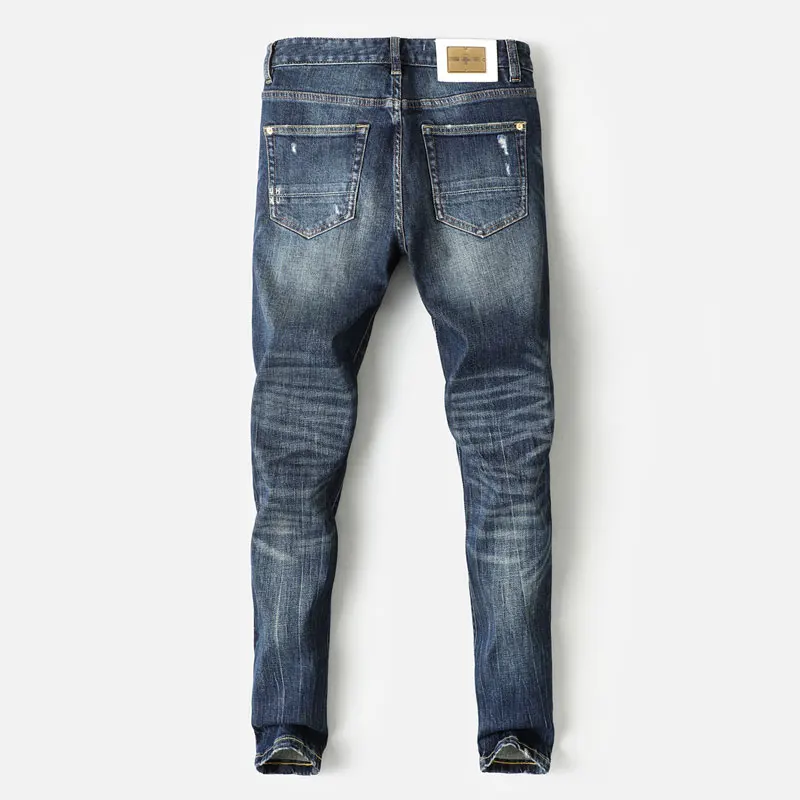 الشارع أزياء الرجال الجينز عالية الجودة خمر الأزرق تمتد سليم صالح مرقع ممزق الجينز الرجال Y2K مصمم الدنيم السراويل Hombre